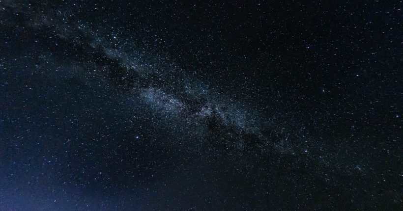 Milky way galaxy with stars and space in the universe background at thailand