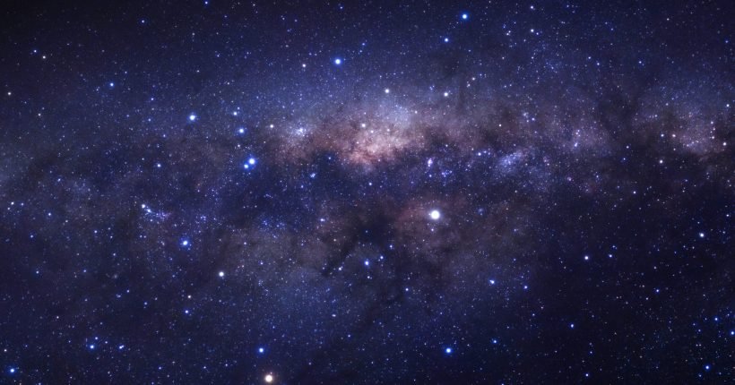 Milky way galaxy with stars and space dust in the universe, Long exposure photograph, with grain.
